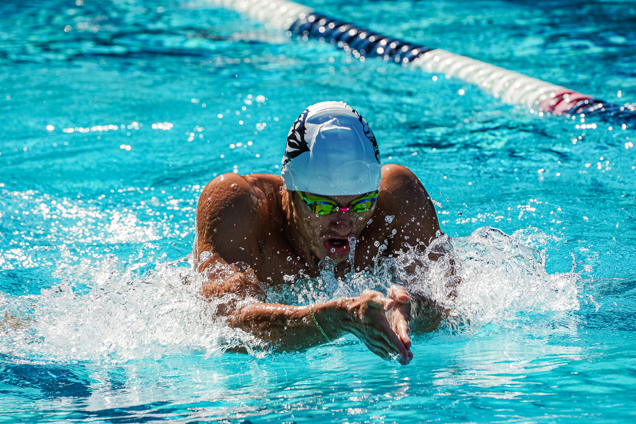 Men's Swimming Races Against McMurry University